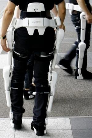 Cyberdyne Hybrid Assistive Limb helping to walk - Prototype Image via Very Smart Design.Cyberdyne Hybrid Assistive Limb HAL-5 helping a physically handicapped person to walk...